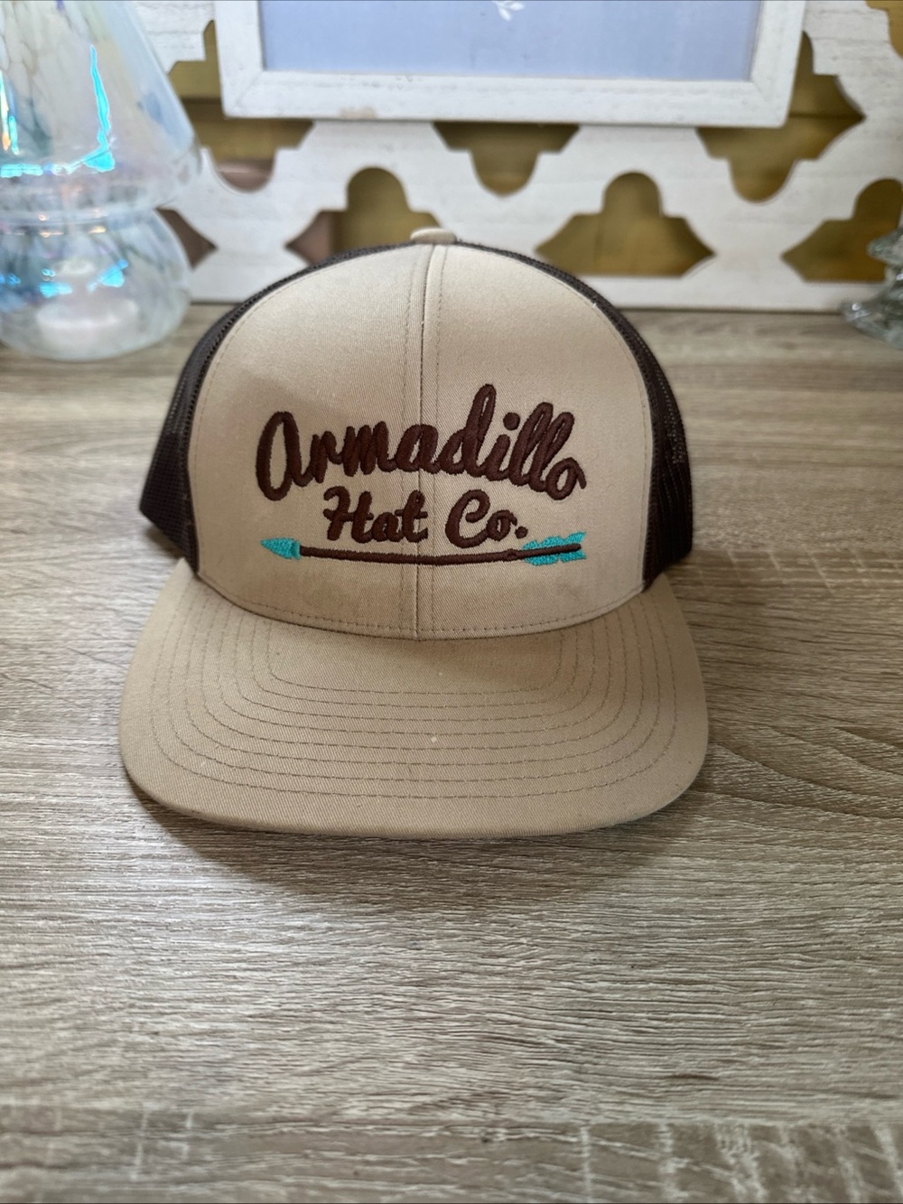 Pacifica Armadillo Hat Co. Beige and Brown Trucker Hat with Teal Accent